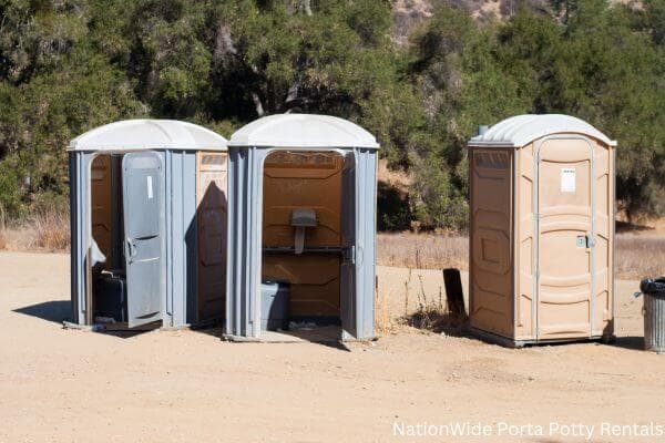 a clean row of portable restrooms for outdoor weddings or festivals in West Fargo, ND